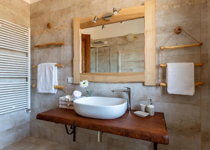 Maila Oda ve Kahvaltı Capoterra