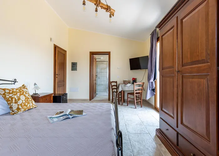 Maila Oda ve Kahvaltı Capoterra