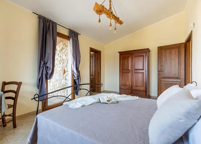 Maila Oda ve Kahvaltı Capoterra